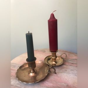 Two antique brass candle holders